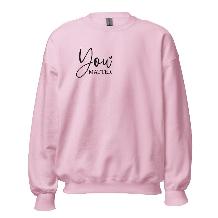 Pink sweatshirt with You Matter front logo and a beautiful message on the back.