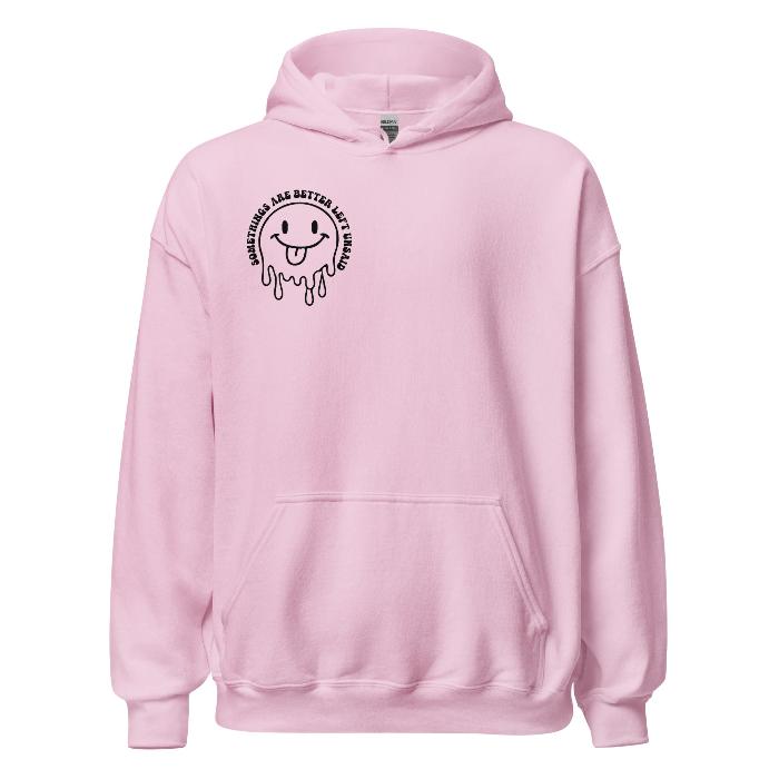 Pink hoodie with melting smiley face logo on the front.  Soft and comfortable hoodie with pouch pocket and fun slogan print on the back.