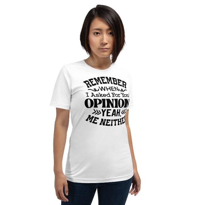 Woman wearing a white unisex t-shirt with fun opinion print. 